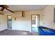 A garage door leads to the outside, while an interior door provides access to the laundry room at 1710 Curry Ave # 42, Nokomis, FL 34275