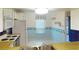 Bright kitchen features a stove, microwave, refrigerator, and a breakfast nook at 1710 Curry Ave # 42, Nokomis, FL 34275