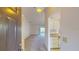 View from the entryway showcasing the carpeted living room area at 1710 Curry Ave # 42, Nokomis, FL 34275