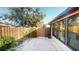 Cozy patio with small garden and wooden fence at 1710 Curry Ave # 42, Nokomis, FL 34275