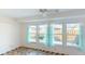 Bright sun room with mosaic tile floor and large windows, providing a serene space with abundant natural light at 1710 Curry Ave # 42, Nokomis, FL 34275