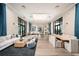Relax in the community lounge with modern furniture at 17126 Savory Mist Cir, Bradenton, FL 34211