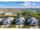 Aerial view of newly built community with ponds and landscaping at 18024 Cherished Loop, Bradenton, FL 34211