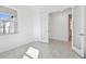 Bright bedroom with tile floors, white walls, and ensuite bathroom access at 18024 Cherished Loop, Bradenton, FL 34211