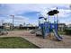 Community playground with slides, swings, and climbing structures on wood chip ground at 4720 Sweet Retreat Run, Bradenton, FL 34211