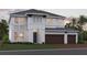 Two-story home with gray exterior, dark brown garage doors, and landscaping at 7537 Nighthawk Dr, Sarasota, FL 34241