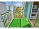 Balcony with artificial turf and partial kitchen view at 7450 35Th N St # 1604, Pinellas Park, FL 33781