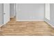 Simple bedroom with light gray walls and light wood flooring at 7450 35Th N St # 1604, Pinellas Park, FL 33781