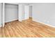 Bedroom with light gray walls, wood flooring and closet at 7450 35Th N St # 1604, Pinellas Park, FL 33781