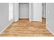 Bedroom with wood-look floors, closet, and window at 7450 35Th N St # 1604, Pinellas Park, FL 33781