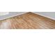 Bedroom with wood-look floors and window at 7450 35Th N St # 1604, Pinellas Park, FL 33781