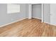 Bedroom with wood-look floors and closet at 7450 35Th N St # 1604, Pinellas Park, FL 33781