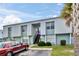 Two-story building exterior with parking at 7450 35Th N St # 1604, Pinellas Park, FL 33781