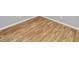 Light brown wood-look laminate flooring at 7450 35Th N St # 1604, Pinellas Park, FL 33781