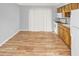 Bright kitchen with wood cabinets and white appliances at 7450 35Th N St # 1604, Pinellas Park, FL 33781