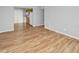 Living room with light gray walls and wood-look flooring at 7450 35Th N St # 1604, Pinellas Park, FL 33781