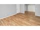 Living room with light wood-look floors at 7450 35Th N St # 1604, Pinellas Park, FL 33781