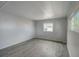 Spacious bedroom with wood-look floors and neutral walls at 207 Dolphin N Dr, Oldsmar, FL 34677