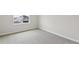 Bright bedroom with neutral walls and carpet at 5943 Jensen View Ave, Apollo Beach, FL 33572