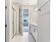 Bathroom with double vanity and walk in shower at 5917 Jensen View Ave, Apollo Beach, FL 33572