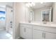 Bathroom features a double vanity and a tub at 5917 Jensen View Ave, Apollo Beach, FL 33572