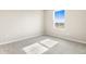 Spacious bedroom featuring a large window at 5917 Jensen View Ave, Apollo Beach, FL 33572