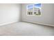 Spacious bedroom with neutral walls and grey carpet at 5917 Jensen View Ave, Apollo Beach, FL 33572