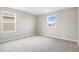 Bright bedroom with neutral walls and carpet at 5917 Jensen View Ave, Apollo Beach, FL 33572