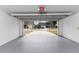 Open garage door revealing a residential street view at 12016 Fruitwood Dr, Riverview, FL 33569