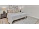 Comfortable bedroom with neutral decor and rug at 407 Belvedere Oval, Temple Terrace, FL 33617