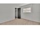 Simple bedroom with neutral walls and carpet flooring at 407 Belvedere Oval, Temple Terrace, FL 33617