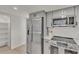 Modern kitchen featuring stainless steel appliances and ample storage at 407 Belvedere Oval, Temple Terrace, FL 33617