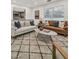 Bright living room with contemporary furniture and kitchen views at 407 Belvedere Oval, Temple Terrace, FL 33617