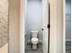 Small bathroom with toilet and vinyl flooring at 9585 Calumet Blvd, Port Charlotte, FL 33981