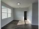 Spacious bedroom with large windows and hardwood floors at 9585 Calumet Blvd, Port Charlotte, FL 33981
