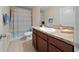 Clean bathroom with tub shower combo at 8609 Fiddleleaf Ct, Tampa, FL 33647