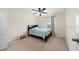 Bright bedroom with ceiling fan and neutral decor at 8609 Fiddleleaf Ct, Tampa, FL 33647