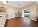 Eat-in kitchen nook with sliding door access to backyard at 8609 Fiddleleaf Ct, Tampa, FL 33647