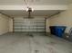 Attached garage with automatic door opener at 8609 Fiddleleaf Ct, Tampa, FL 33647