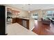 Modern kitchen with stainless steel appliances and wood cabinetry at 8609 Fiddleleaf Ct, Tampa, FL 33647