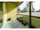 Private screened porch overlooks a grassy backyard at 8609 Fiddleleaf Ct, Tampa, FL 33647
