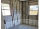 Unfinished kitchen with block walls and wood flooring at 4903 Green Key Rd, New Port Richey, FL 34652