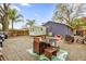 Private backyard with patio, shed, and ample space for entertaining at 1313 Louisiana St, Plant City, FL 33563