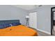 Bright bedroom with a double bed and large closet at 1313 Louisiana St, Plant City, FL 33563