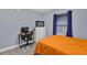 Small bedroom with a single bed and workspace at 1313 Louisiana St, Plant City, FL 33563