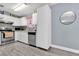 Modern kitchen featuring stainless steel appliances and tile flooring at 1313 Louisiana St, Plant City, FL 33563