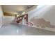 Spacious garage with decorative wall art and epoxy floor at 9093 Players Dr, Weeki Wachee, FL 34613
