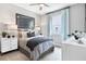Serene bedroom featuring a comfortable bed and plenty of natural light at 9109 Players Dr, Weeki Wachee, FL 34613