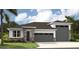 Two-story home with stone accents and a two-car garage at 9157 Players Dr, Weeki Wachee, FL 34613