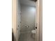 Simple half bathroom with pedestal sink and toilet at 5046 Avalon Park Blvd, Wesley Chapel, FL 33545
